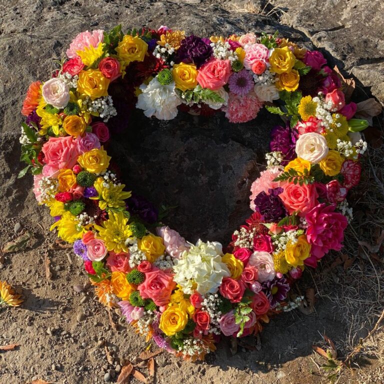 Floral wreath in the shape of a heart.